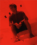 DT sitting on steps physicaly, while making steps ahead musicaly, djing in Rhodes
